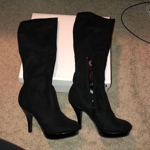 Unlisted black knee high heeled boots